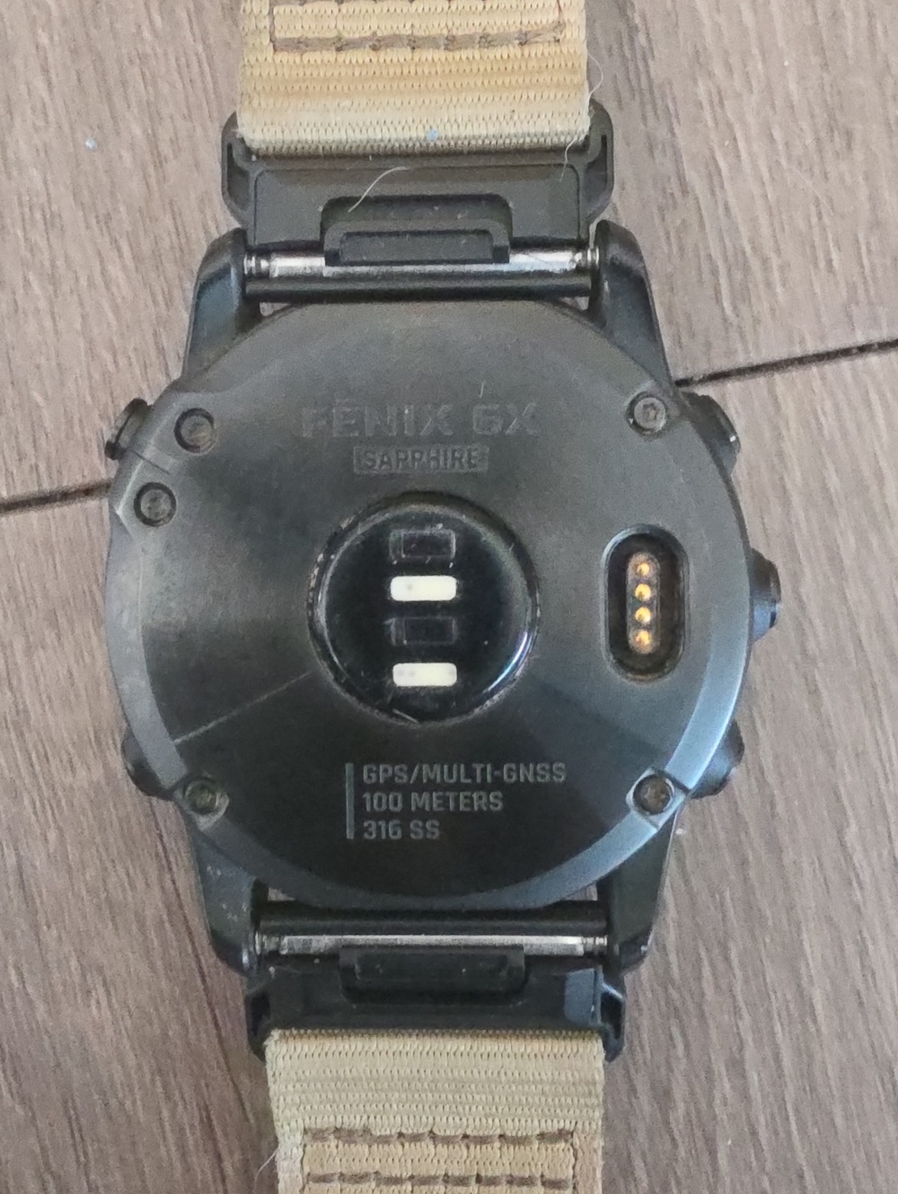garmin Fenix GX watch back in black with tan strap